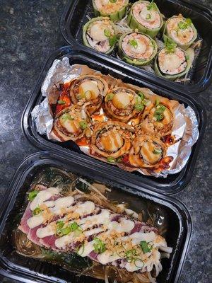 Tropical Roll, Baked Salmon and Crab Roll, and Tuna Tataki Salad