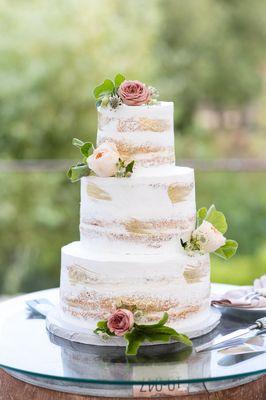 3-tier cake. Vanilla filling on the top and bottom tier & pink champagne in the middle tier.