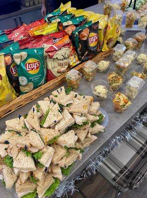 Assorted freshly made sandwiches prepared by Cranberry Hills Eatery & Catering, showcasing their catering services for events...