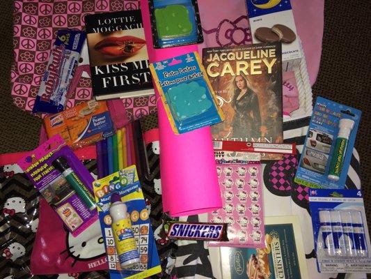 Some crafty poster making supplies, candy, Moon Pies, books, candles, and a Bingo dabber: Mom must be arriving soon :) 4.22.17.