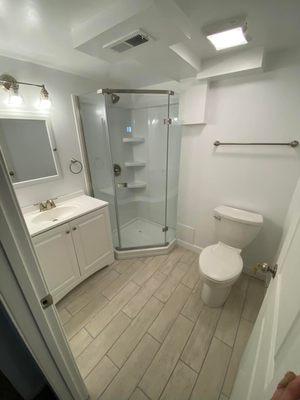 Complete bathroom remodel. Added shower and extended room in basement.