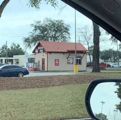 Just a tiny little shack in the middle of the parking lot.