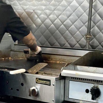 The grill of Los Tacos Poca Madre which is inside Ben's Deli.