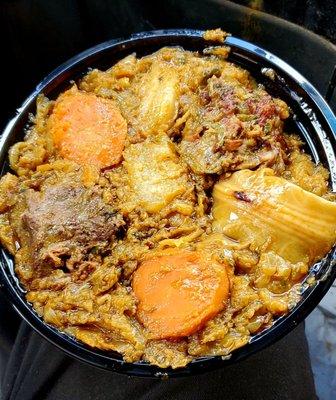 Legume. Haitian stew with cabbage, eggplant, chayote, spinach, and other veg, with pork sholder, goat, etc. Savory & very tasty.