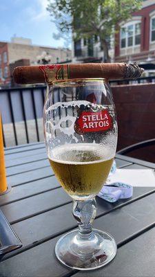 Beer and cigar on patio