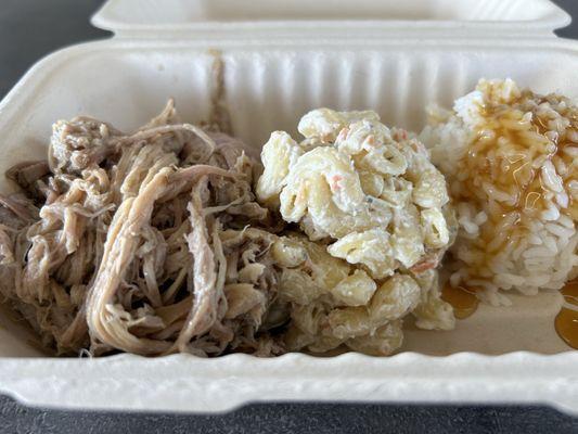 "Kalua Pig" (tasty but salty) Macaroni salad , and rice.