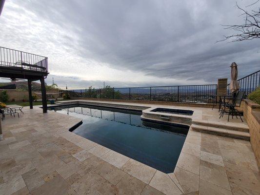 Travertine pavers and stone work are immaculate