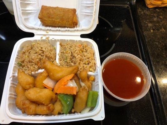 Lunch special Sweet & Sour Chicken w/fried rice & an egg roll. Very good!