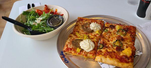 Pizza and salad on a table!