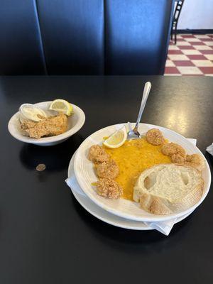 Seafood stuffed potato with a side of catfish