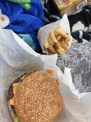 Hawaiian burger with fries.