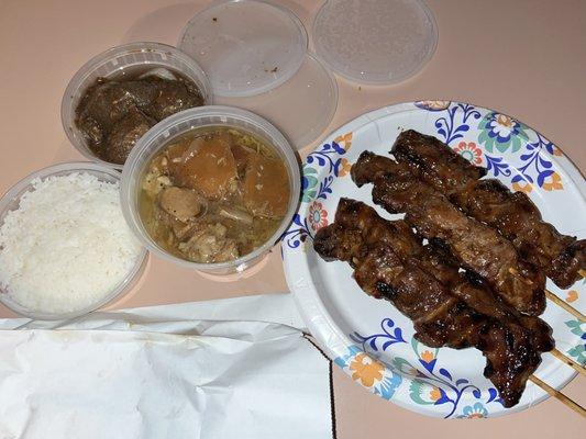 white rice, stewed beef and pork, plus BBQ chicken and pork skewers