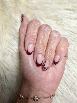 Gel Mani with French tip design.