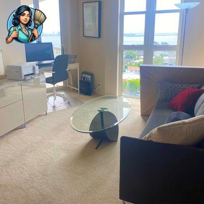 Dining area in Miami home perfectly set, surfaces dust-free and floors polished to a high shine.