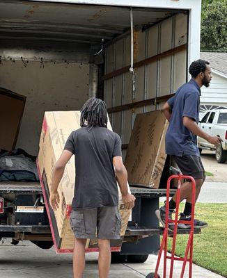 Off loading one of the last boxes.