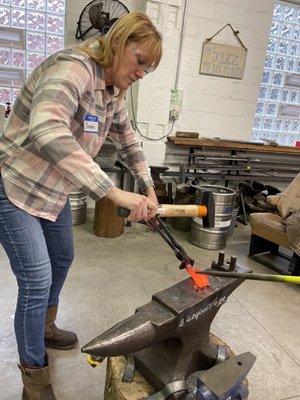 Making a bottle opener.