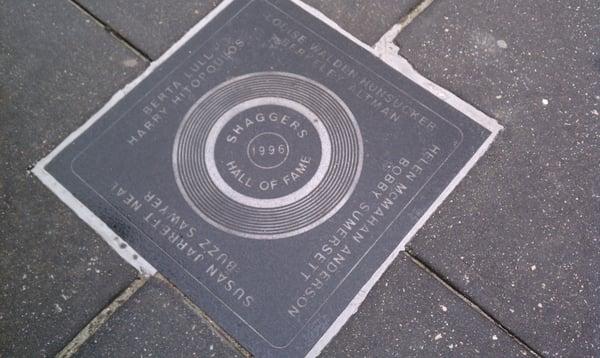 One of several Shag Walk of Fame plaques in the sidewalk in front of Fat Harold's