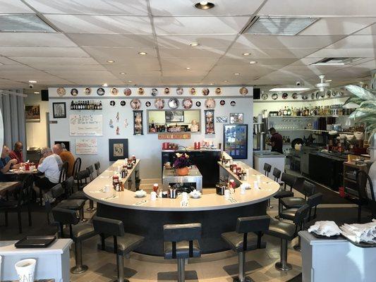 Horseshoe counter/bar and Marilyn Monroe décor.