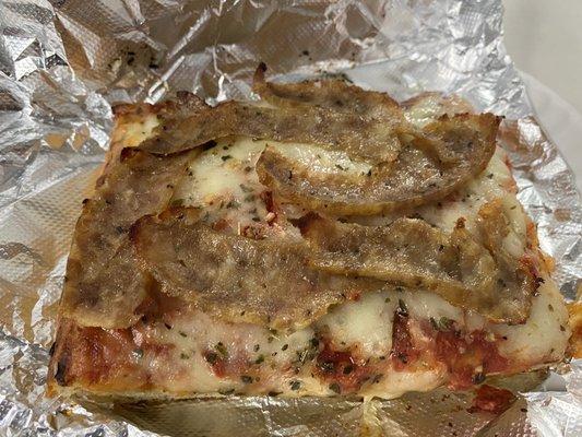 Sicilian Pizza Slice with sausage