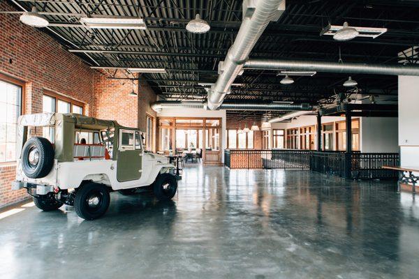 "The Classic" room is our immediate upstairs room and looks over the Showroom below with iron railings.