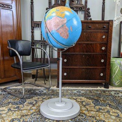 Vintage globe on rolling stand