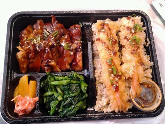 Sweet Teri chicken and Crispy Shrimp Tempura on brown furikake rice with daikon and greens...its a seven buck lunch ;-)