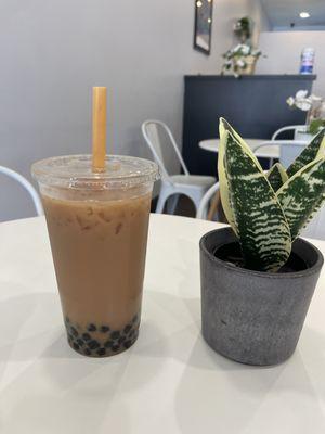 Black Tea with just a splash of milk tea with boba