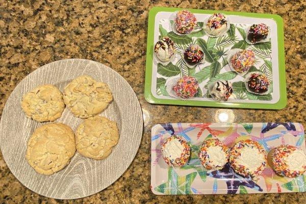 Large chocolate chip cookies. Cupcakes with sprinkles and I believe the last one is cake balls. So good.