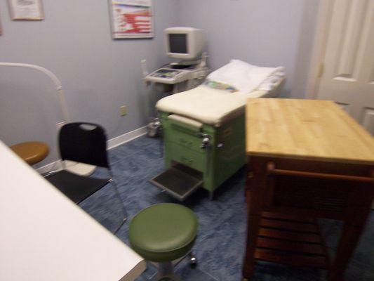 Ultrasound room where an RDMS technician will perform an abdominal scan to determine the viability, heartbeat, and age of your baby.