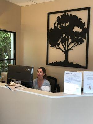 Laura, our office manager waiting to offer you great customer service.