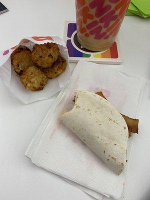 Bacon wake up wrap, hashbrown rounds, iced vanilla coffee