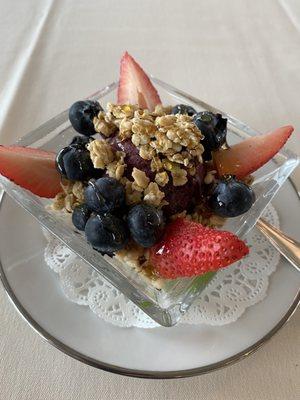 Acai sorbet with granola, honey and fruits