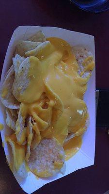 Stadium favorites nachos. So much cheese.....