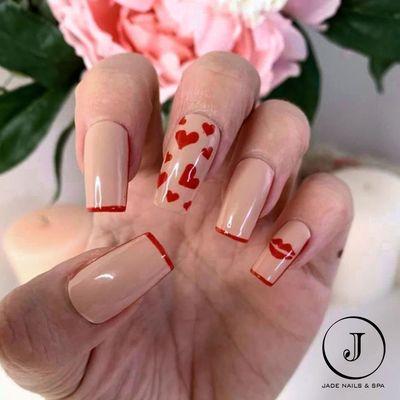 Transform your nails with Jade Nail's charming heart designs.