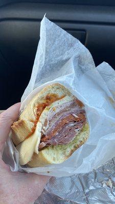 Meat sandwich with pesto and hot sauce