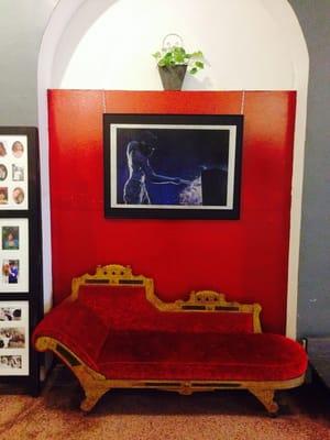 A studio alcove with an original aluminum print by Amelia.