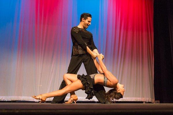 YCD Pro Teacher Matt Mancuso performing at 2016 Hot Ballroom Night with salsa student Michelle Green Dobler