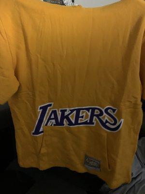 Notice how the pocket is covering the Lakers' logo and the logo is allll the way at the bottom.