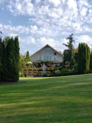 View of the reception hall from grounds/gardens below