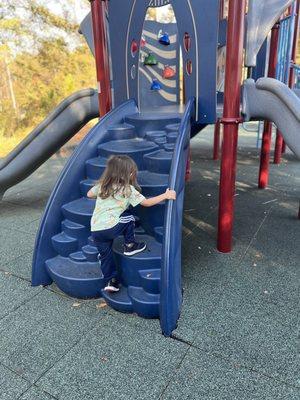 My son playing on the 2-5yo playground.