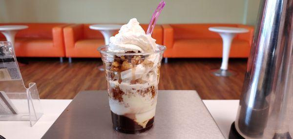 Parfait : Vanilla and coconut FroYos with Caramelized Walnuts, toasted coconut and  hot fudge - topped with homemade whipped cream...