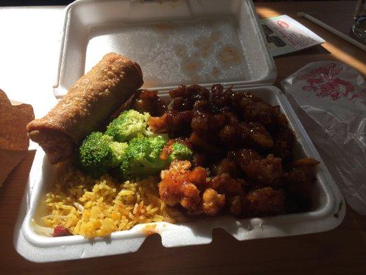 Orange chicken combo $9.25 (comes with egg roll and pork fried rice!)