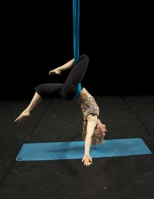 Jayne practicing aerial yoga