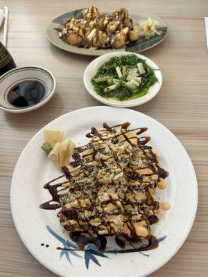 Volcano Roll (closest), seaweed salad, crunchy tuna roll--all delicious