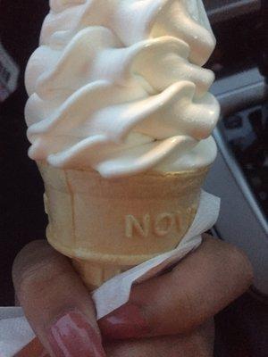 Soft serve vanilla ice cream on a wafer cone!