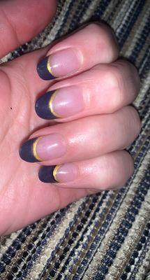 Powder dip navy French tip with a gold handpainted pinstripe