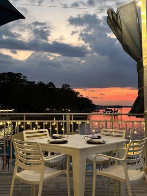 Outdoor seating with view of the sunset