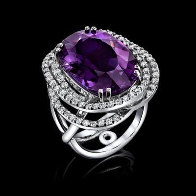 One of a kind design featuring a 11.69 carat amethyst.