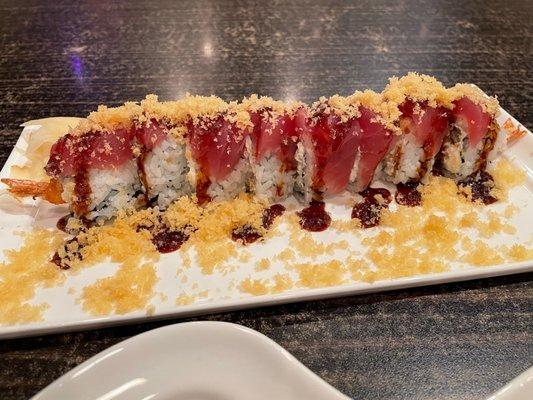 King Cake Roll -- coconut shrimp, cream cheese, tuna, eel sauce and crunchy.