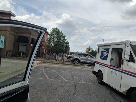 Sad this was in frt of t mobile and smoothie king. Parked blocking two handicap slots while delivering mail to plaza.